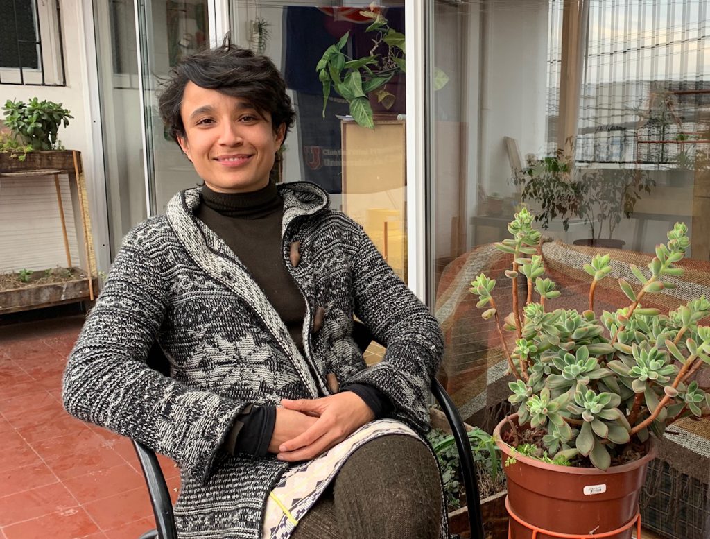 Monse Sepulveda relaxing on her patio. ©2019, Cyndie Bukhardt.