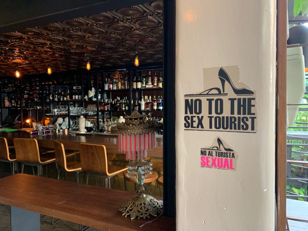 Restaurant sign saying no to sex tourism, Medellin,  Colombia