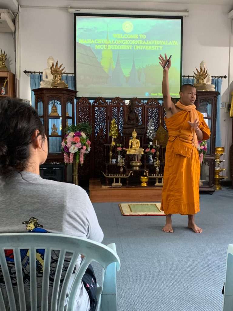 Sone teaching the fundamentals of Buddhism